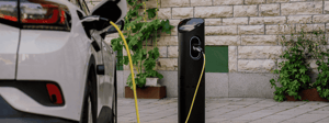 Qwello neemt Park&Charge over